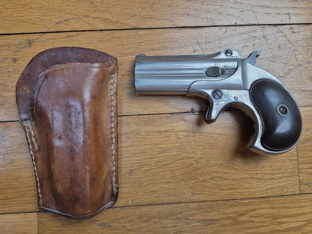 Ikonische Doppel-Pistole Derringer Remington M95 – Kal. 41RF – Typ II – Nickel-Finish – Ausgezeichneter mechanischer Zustand – Sehr schöne Läufe – Perfekte Auswurf – Griffschalen aus Ebonit in sehr gutem Zustand – 80.000 Exemplare – Gürtelholster! – Ein „Joker“ im Ärmel eines As in ausgezeichnetem Zustand – TBE++, Bild 20 von 22