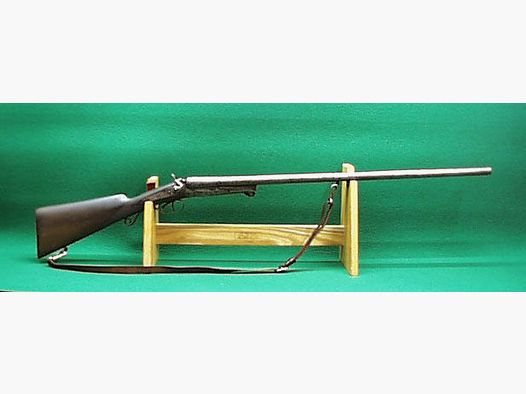 Double-barrel shotgun with spoon lock