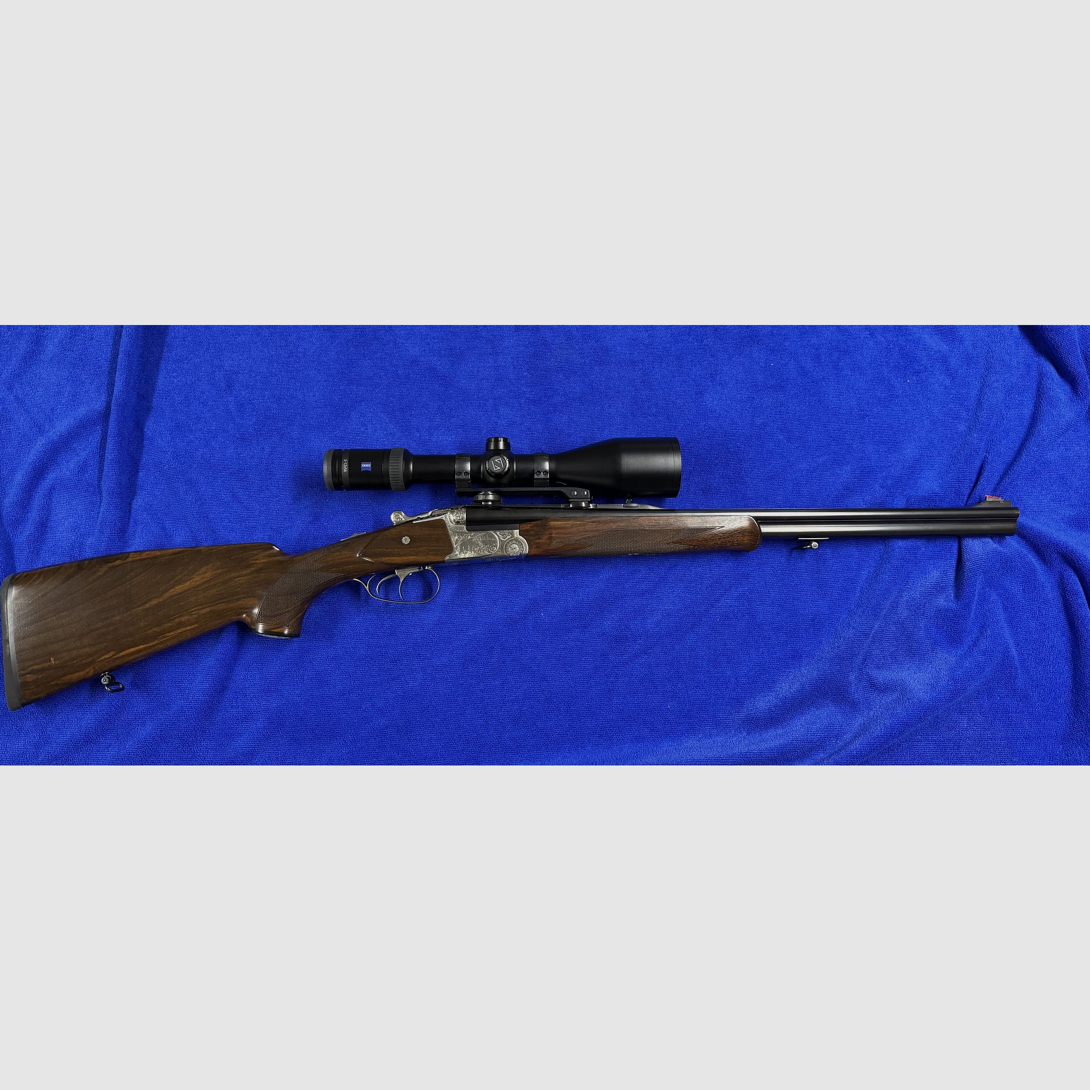 Merkel Doppelbüchsdrilling DR 961L con visor ZEISS Victory HT 3-12x56