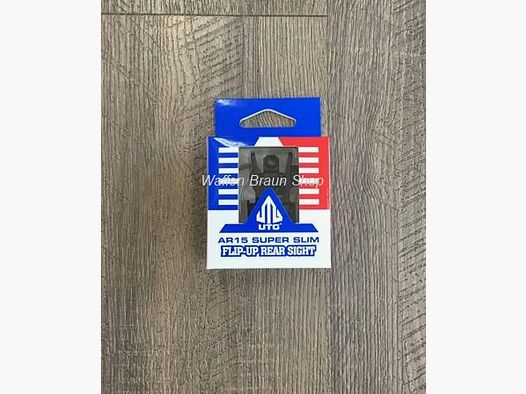 Visera plegable de perfil bajo y doble apertura de objetivo