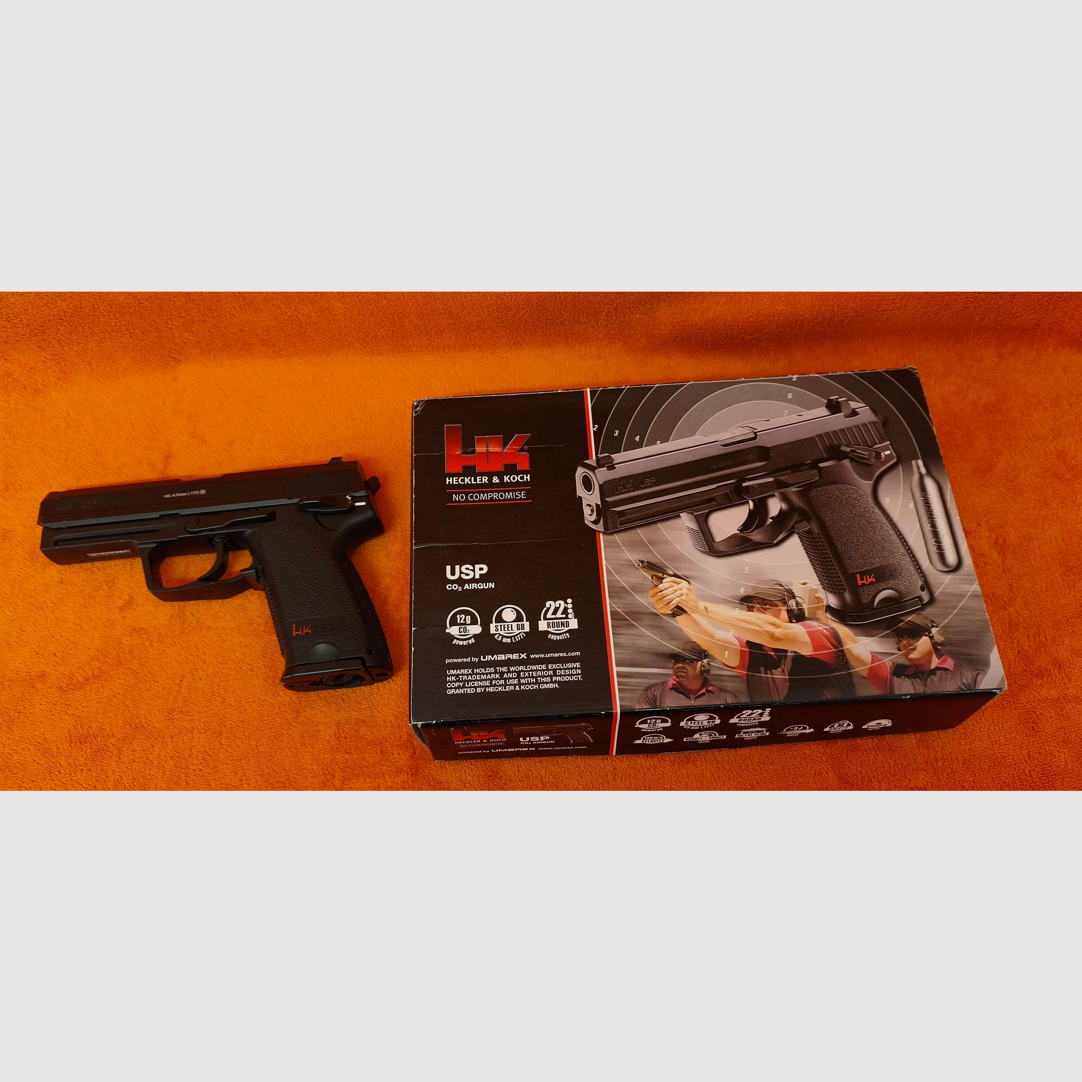 HK USP CO2 air pistol 4.5mm steel BB with signs of use