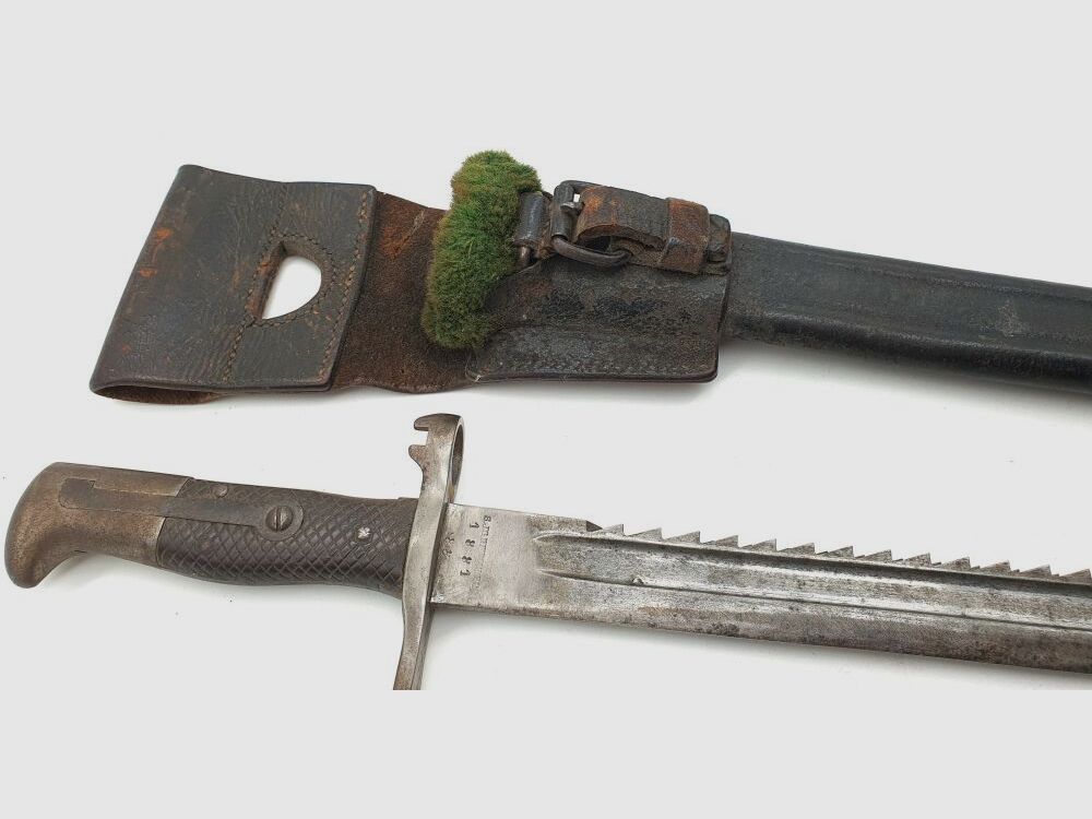 Vetterli original Vetterli bayonet with saw teeth and green fur on the scabbard