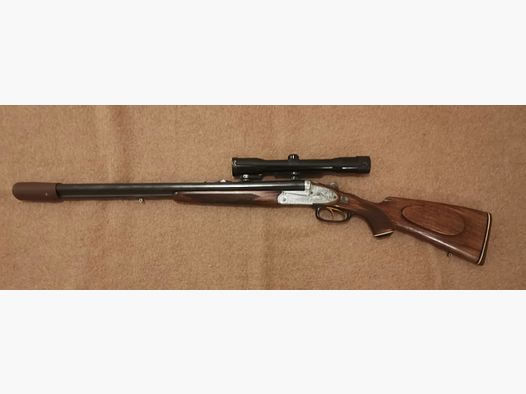 Drilling Winkler Ferlach 12/70, 7 x 65R with two scopes