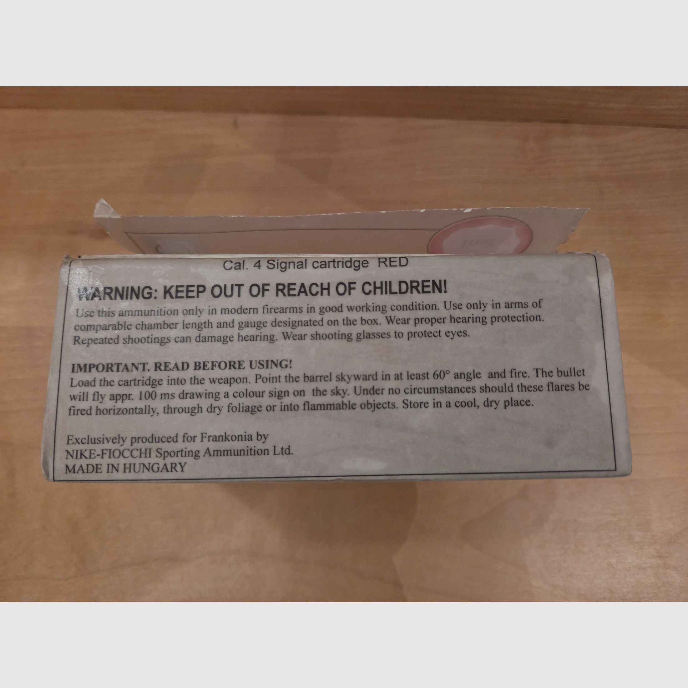 Flare gun with red signal ammunition