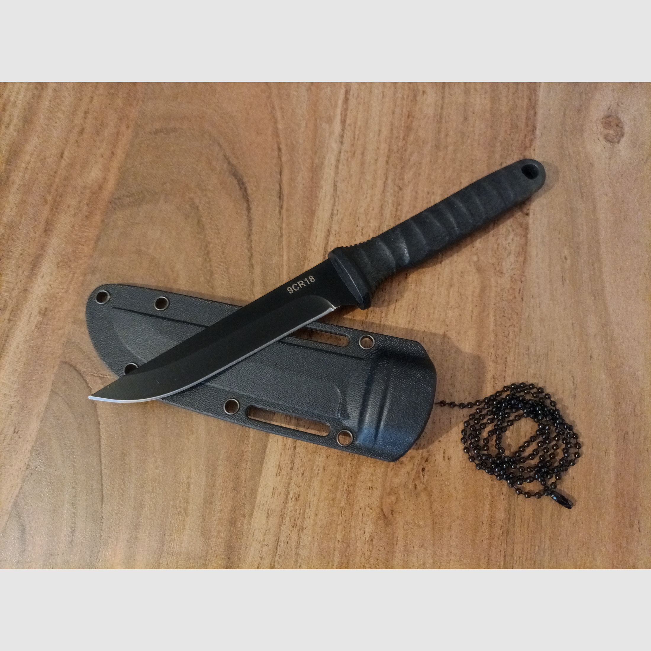 Schönes Taschenmesser Edelstahl mit Scheide zum einrasten.