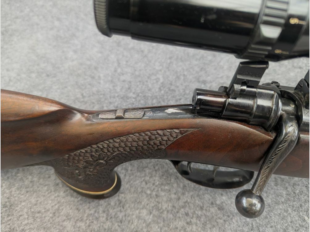 Mauser Mod 98 with animal engraving and stalking safety