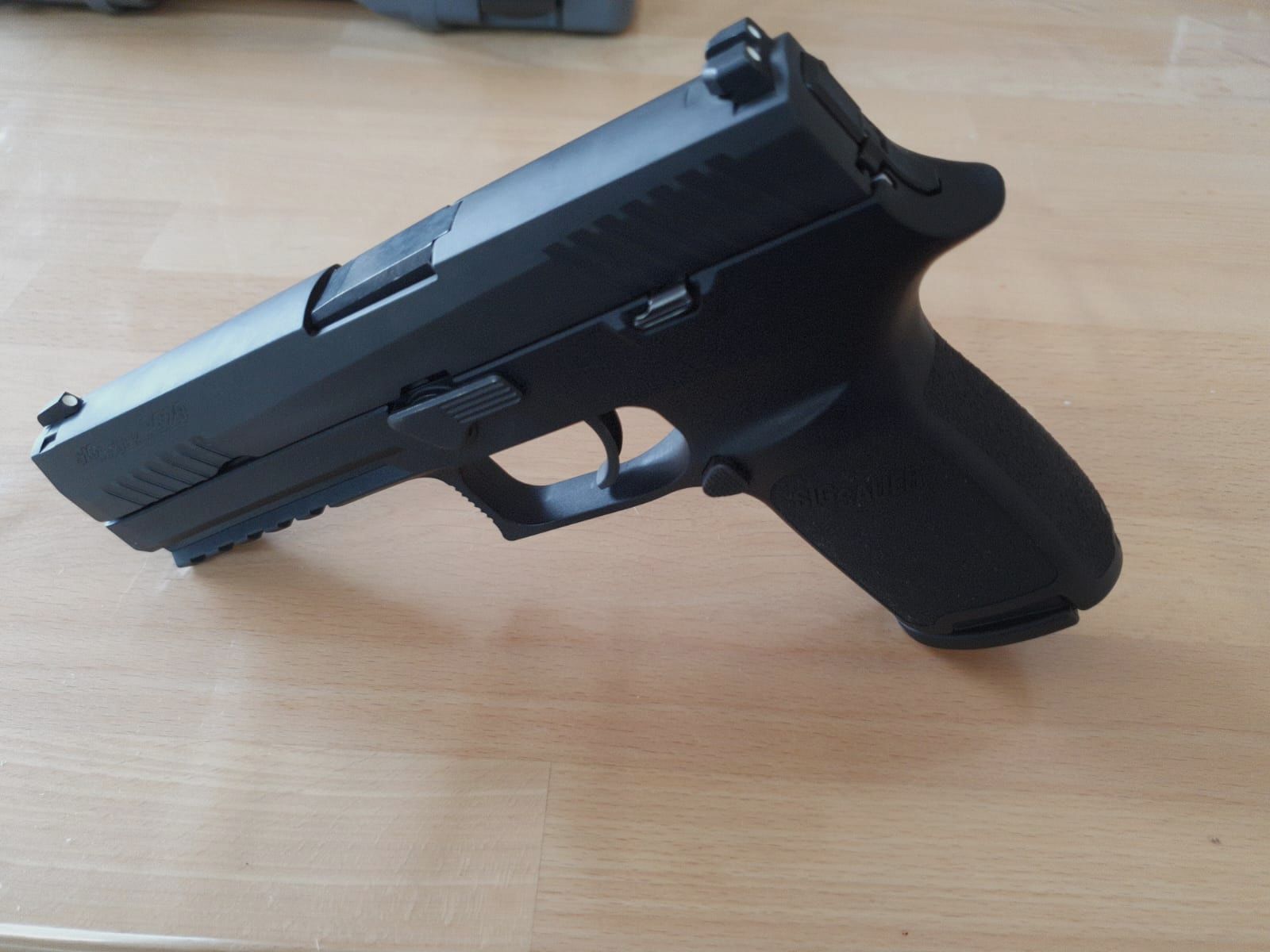 Sig Sauer P320 9mm Fullsize with case well-maintained condition