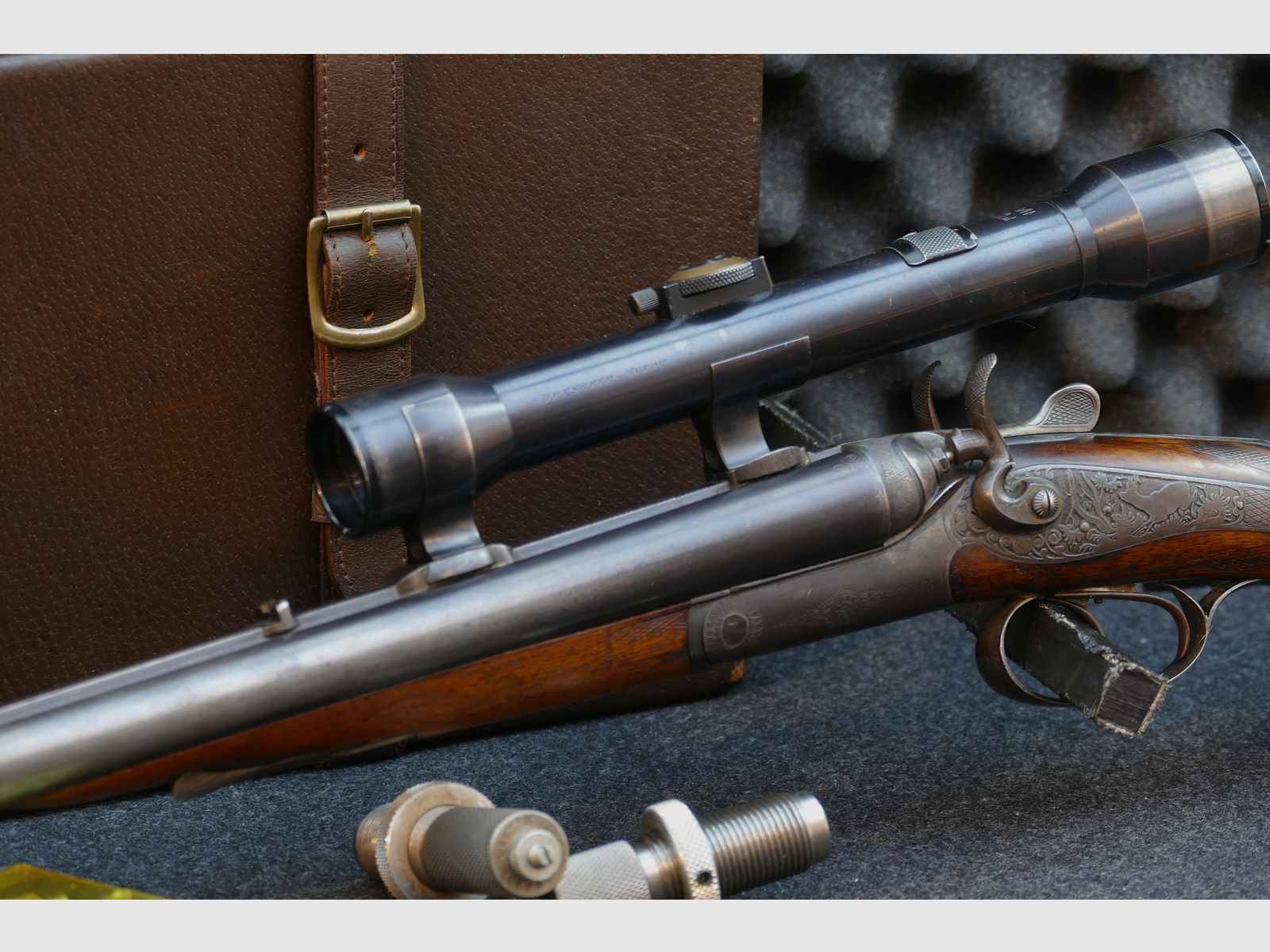 Cockshotgun from Ferlach, cal. 8×57 R‑360 / 16/65, scope Kahles Vienna H/4×, leather travel case, dies, cases, and bullets (173)