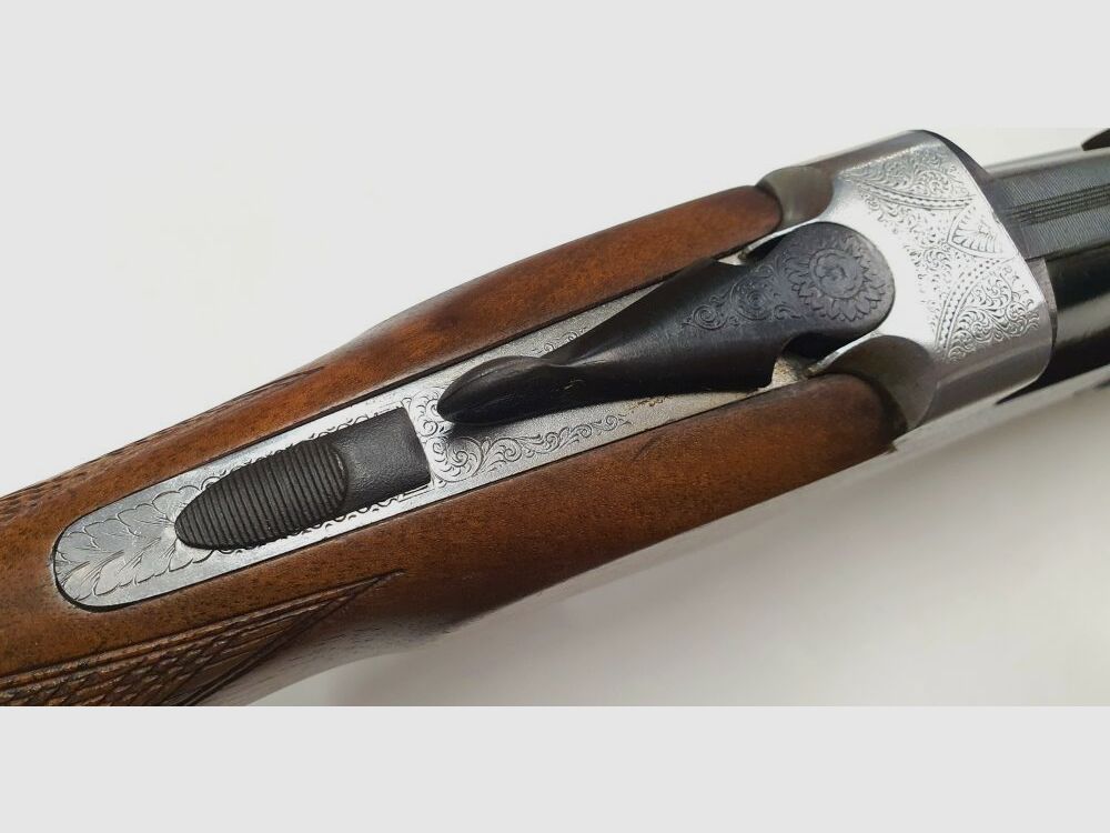 A.V.Maroccini trampa de bosque con grabados muy bonitos en calibre