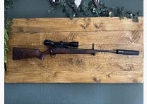 Acción de acero HS .270win clase de madera 4 incluye Swarovski z6i 2-12x50 y silenciador