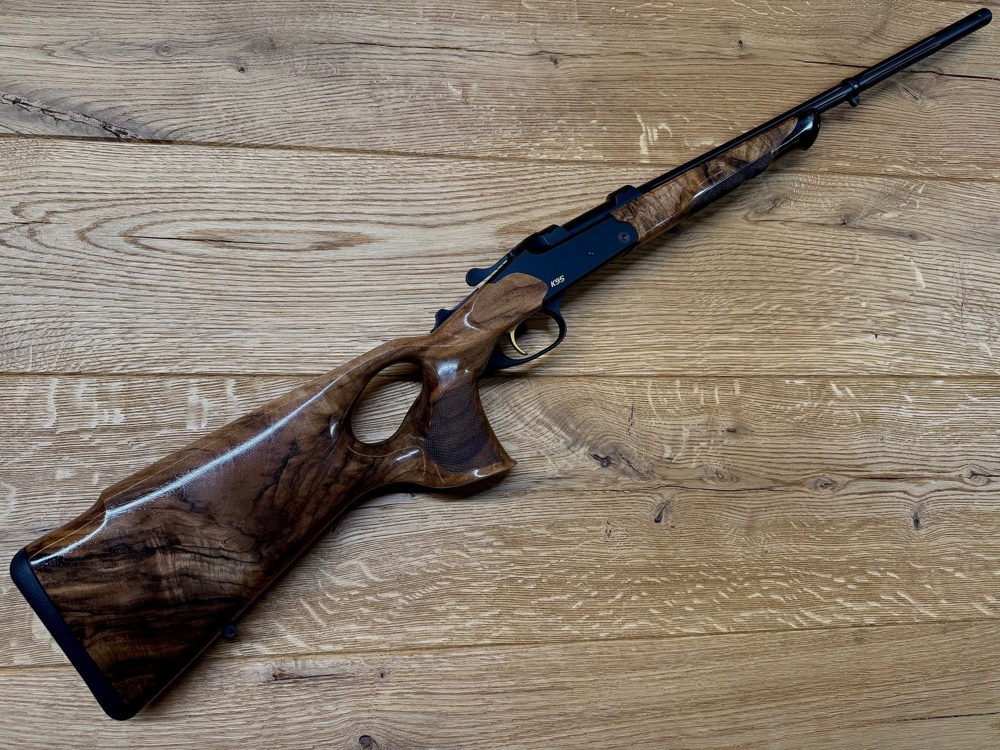 Blaser K95 Success / Klasa drewna 6 / Kal. 6,5 Creedmoor / LL 47 cm / Złote elementy / M15x1