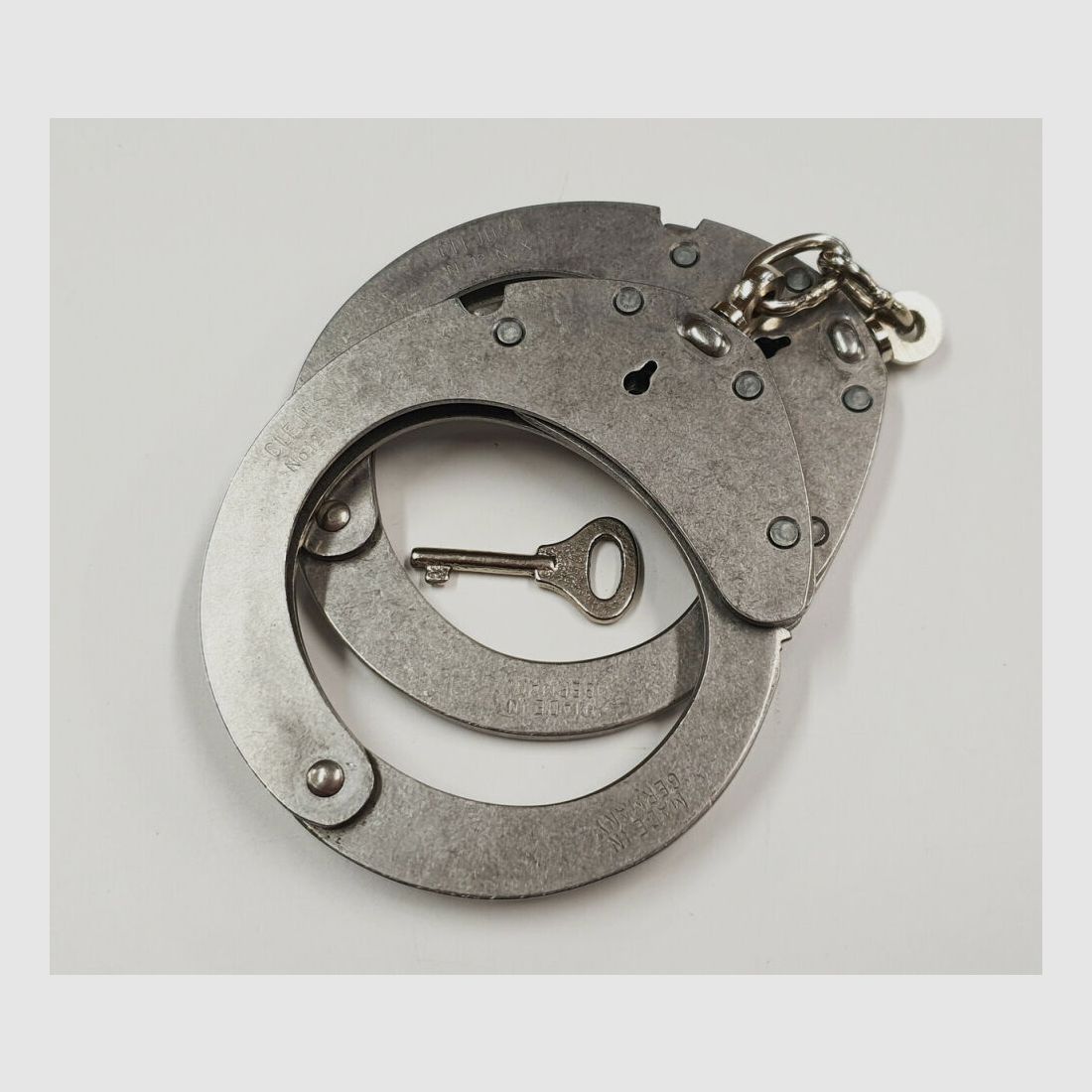 CLEJUSO Clemen & Jung e.K. Handcuff CLEJUSO No. 12 INOX, stainless steel handcuff, made in Germany, used