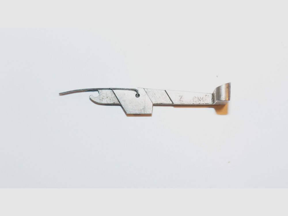 Waffenfabrik Bern Gebr. Verschlußfanggelenk mit Feder f. Schweizer Ordonnanzpistole Parabellum 1906 Kal.7,65mmPara P08