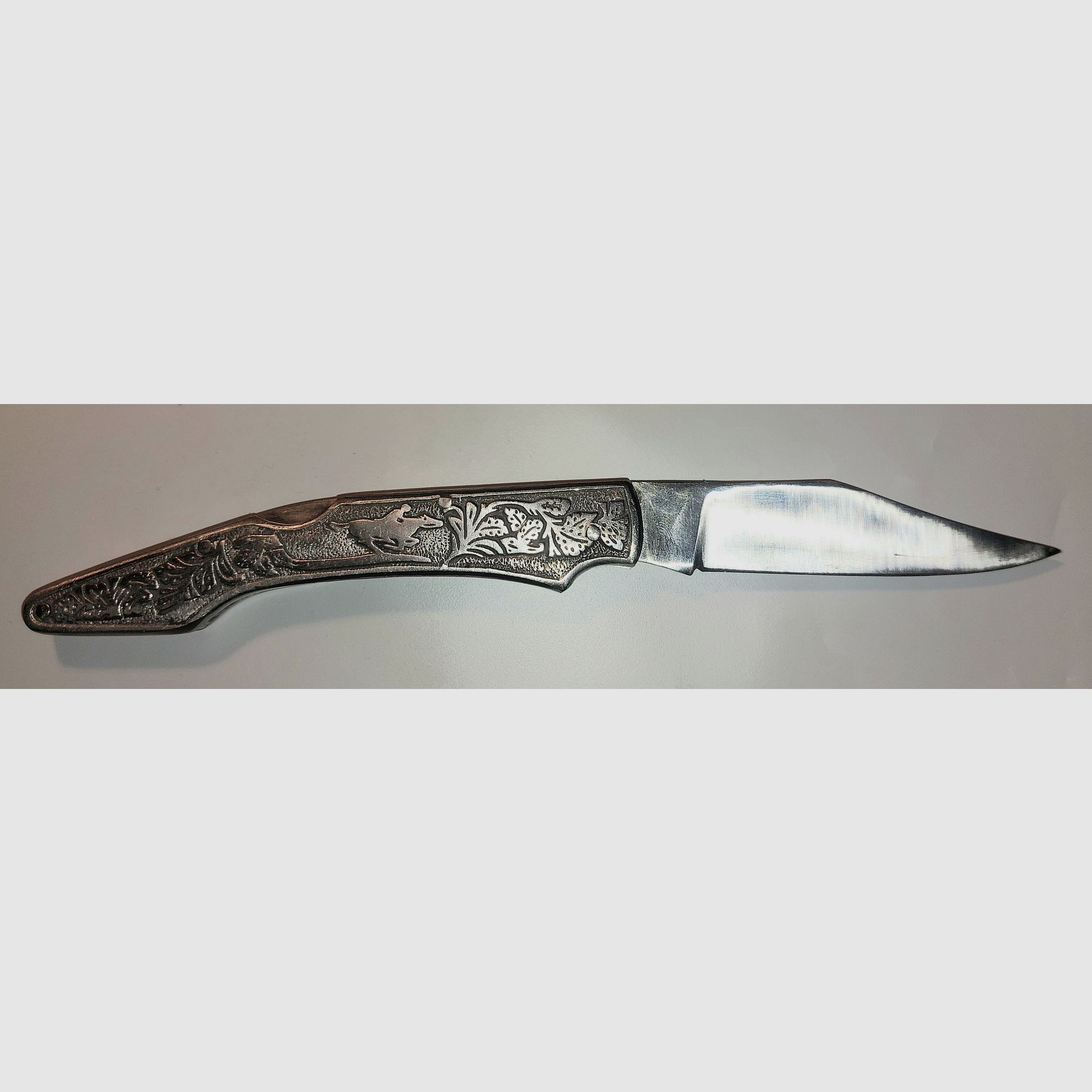 Pocket knife with rider motif, price negotiable