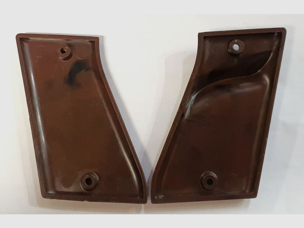 Unknown pair of grip panels with thumb rest unknown