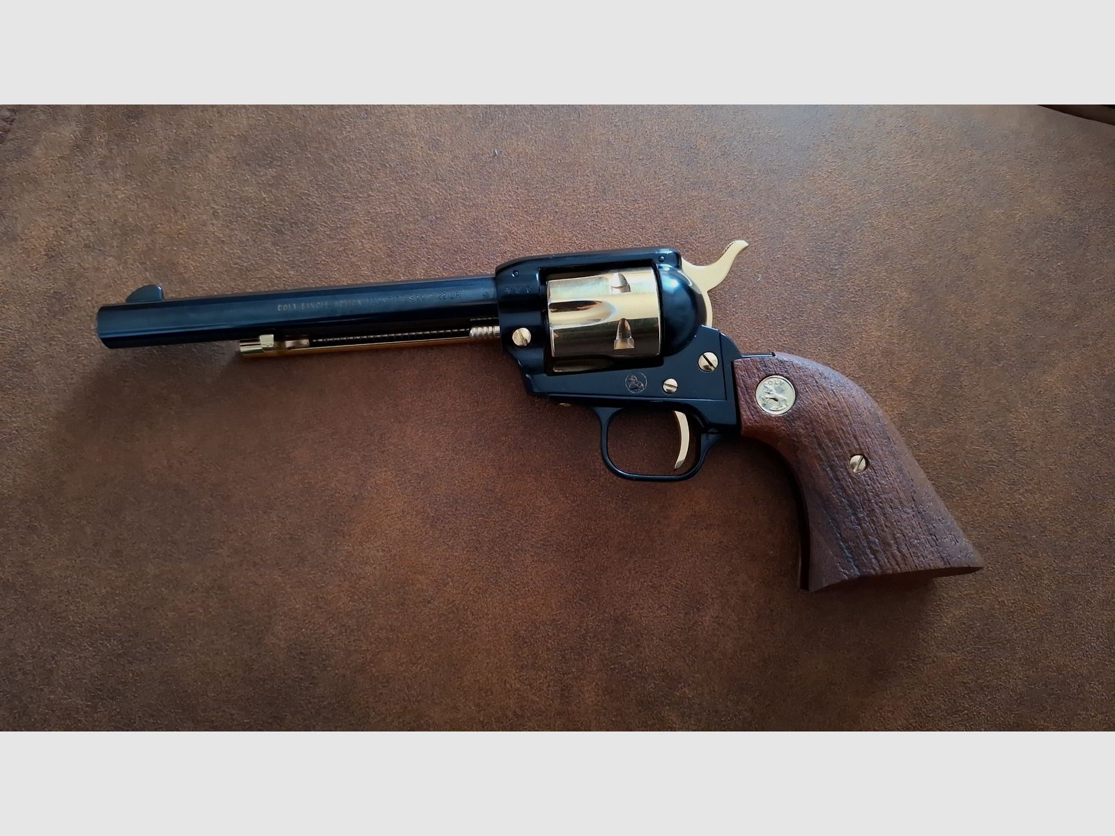 Revolver, Colt Mod.1873 SA Golden Spike, teilvergoldet, Kaliber .22lr, 6"Lauf