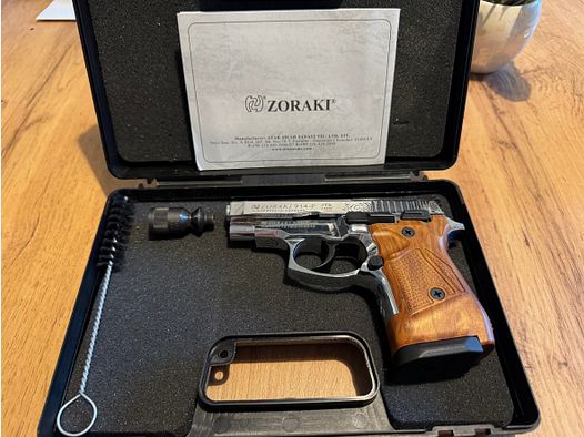 Zoraki 914 Pistolet alarmowy kal. 9mm P.A.K. chromowany, grawerowany.