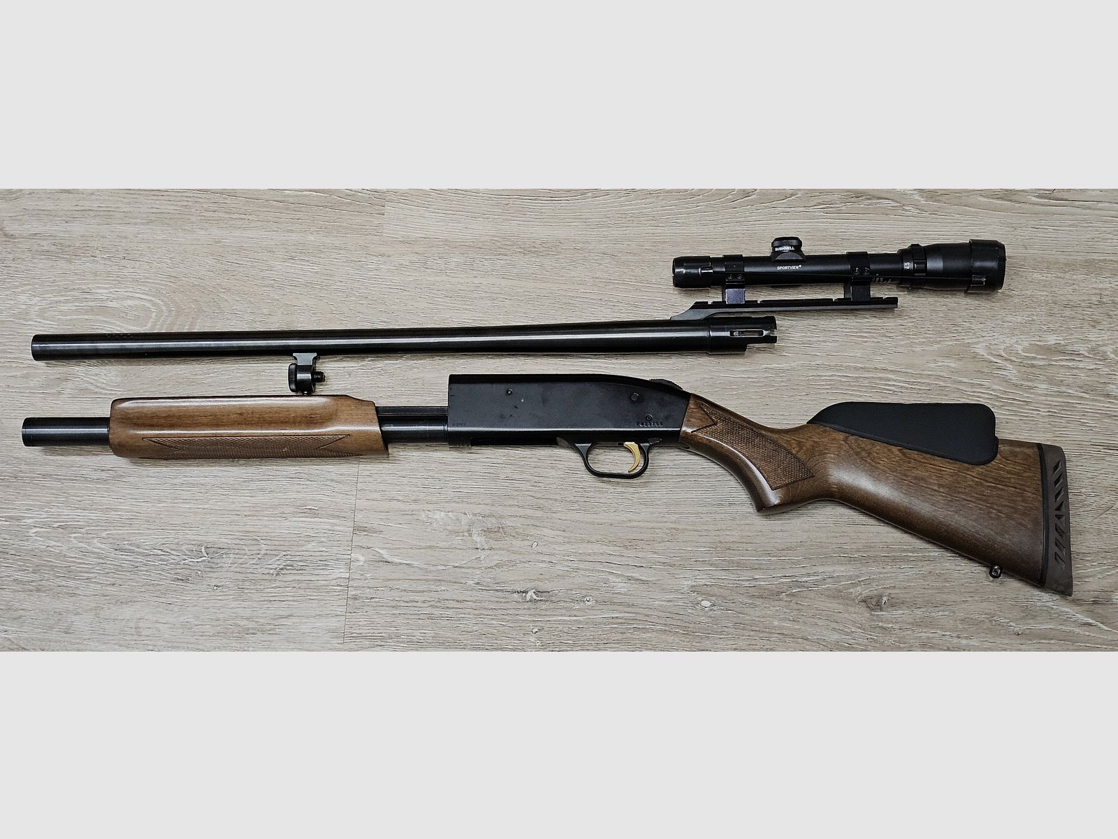 Mossberg 500A caliber 12/76, forend repeater, pump shotgun, rifled barrel with Bushnell scope