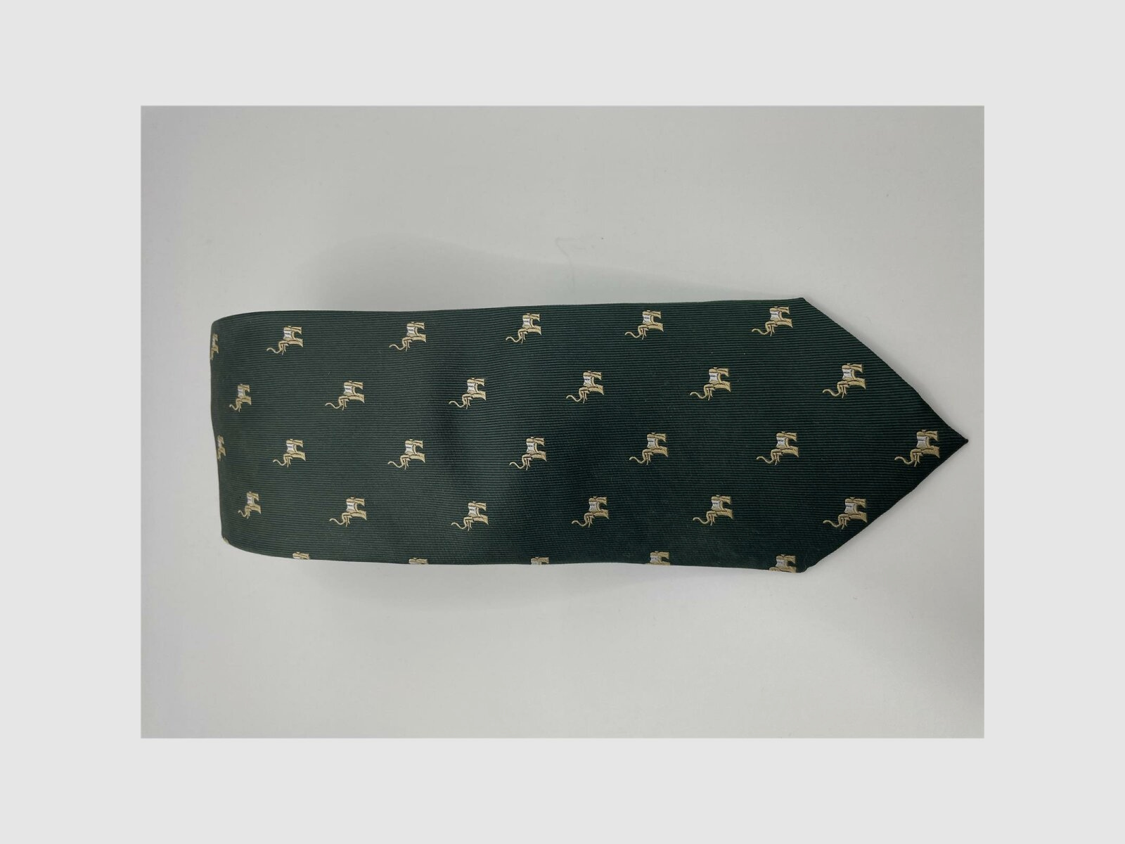 Cravatta verde scuro motivo elefante beige