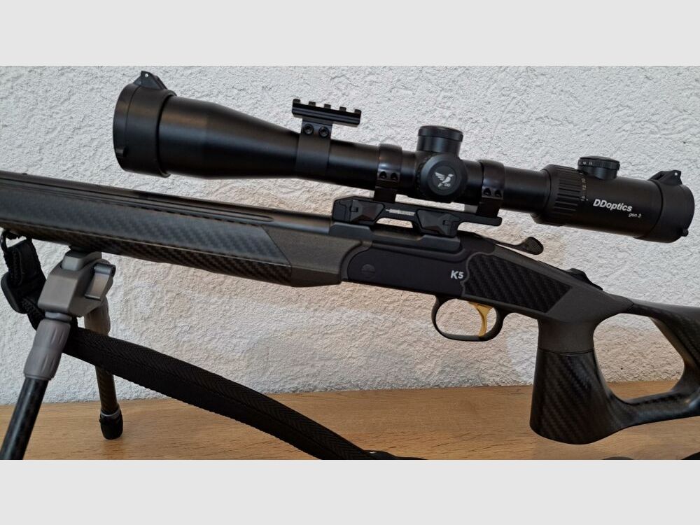Merkel K5 Extrem mit FBT Carbon Lochschaft, DDOPTICS Zielfernrohr, Recknagel Schalldämpfer, Spartan Zweibein, Automatik Gewehrriemen, Luxus Koffer etc.