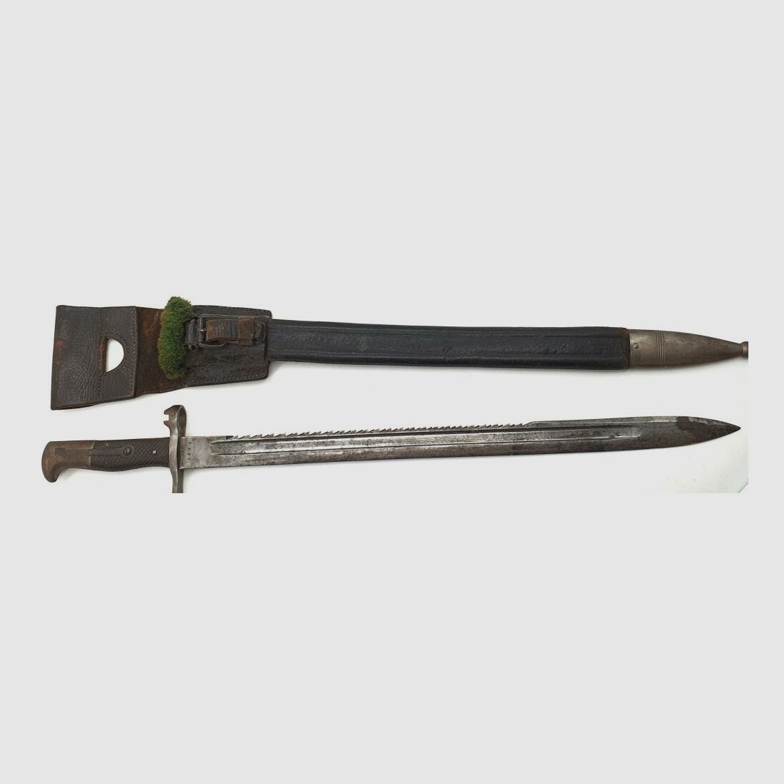 Vetterli original Vetterli bayonet with saw teeth and green fur on the scabbard