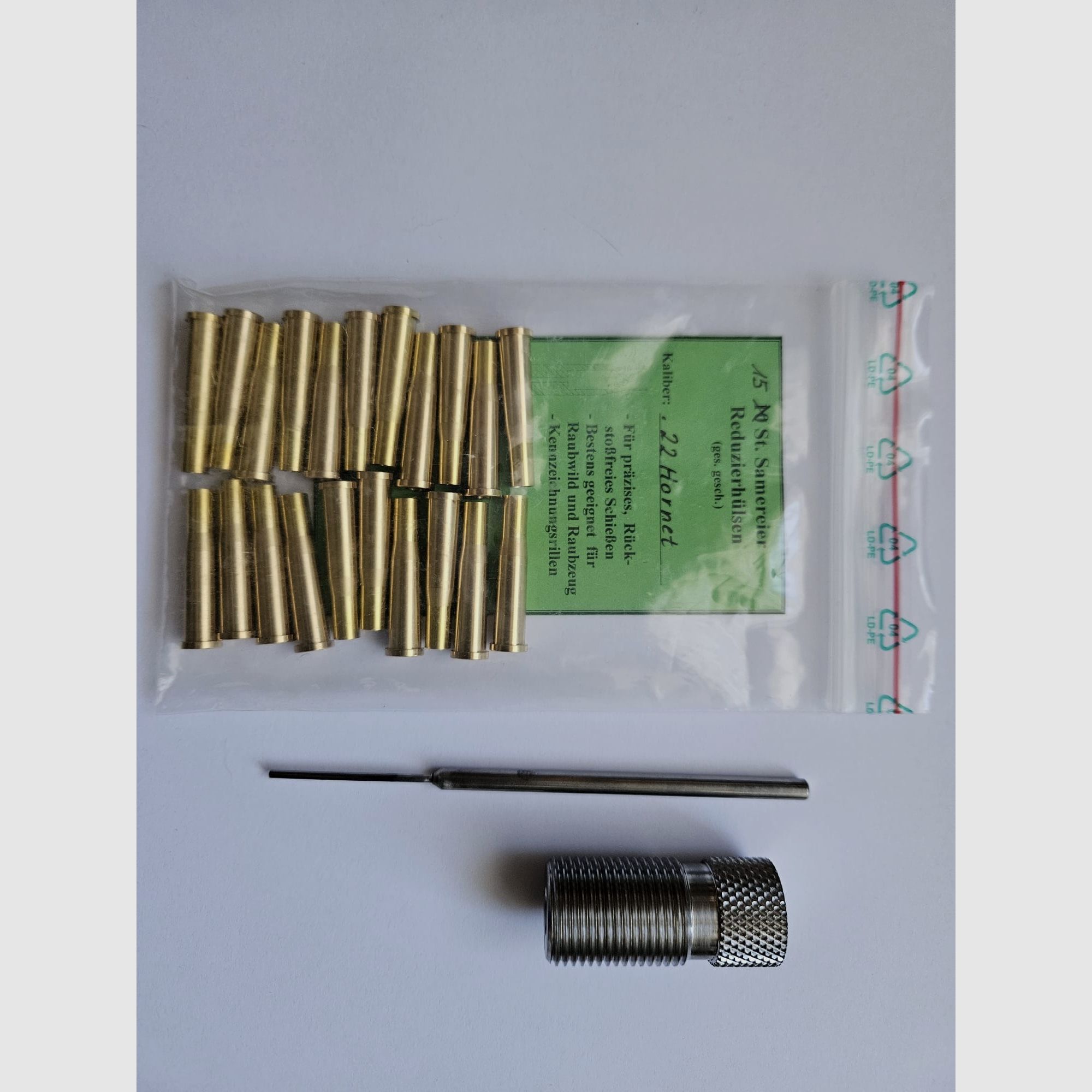 21 Samereier reducing cases .22 Hornet with die New and unused