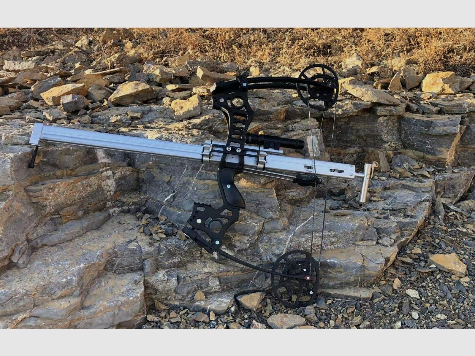 Shotgun compound bow - firing a shot of pellets using a bow