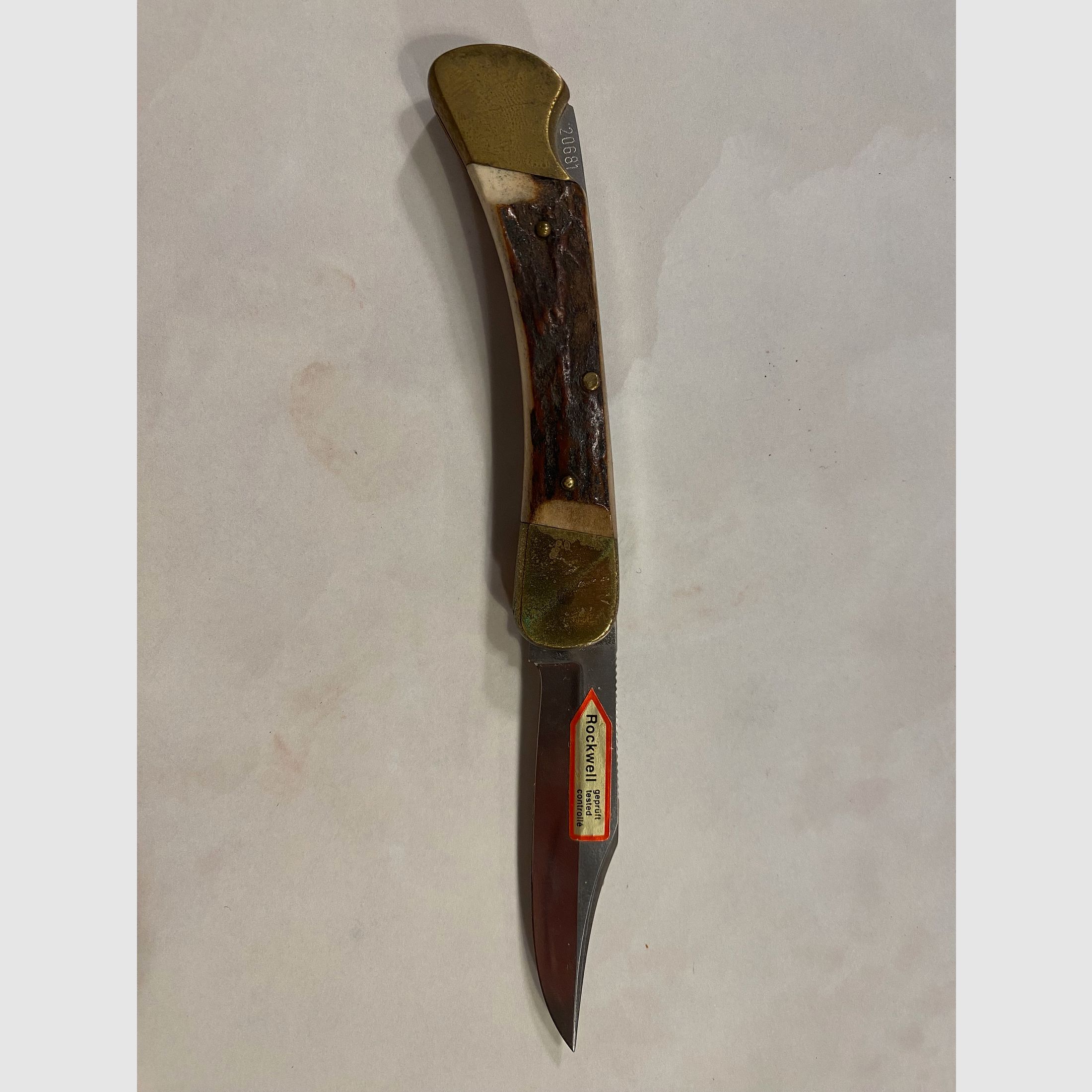 Coltello pieghevole classico Folding-Hunter – accessori in ottone – manico in corno di cervo/osso – testato Rockwell