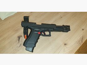 Glock 17 9mm, with accessories and subtle tuning