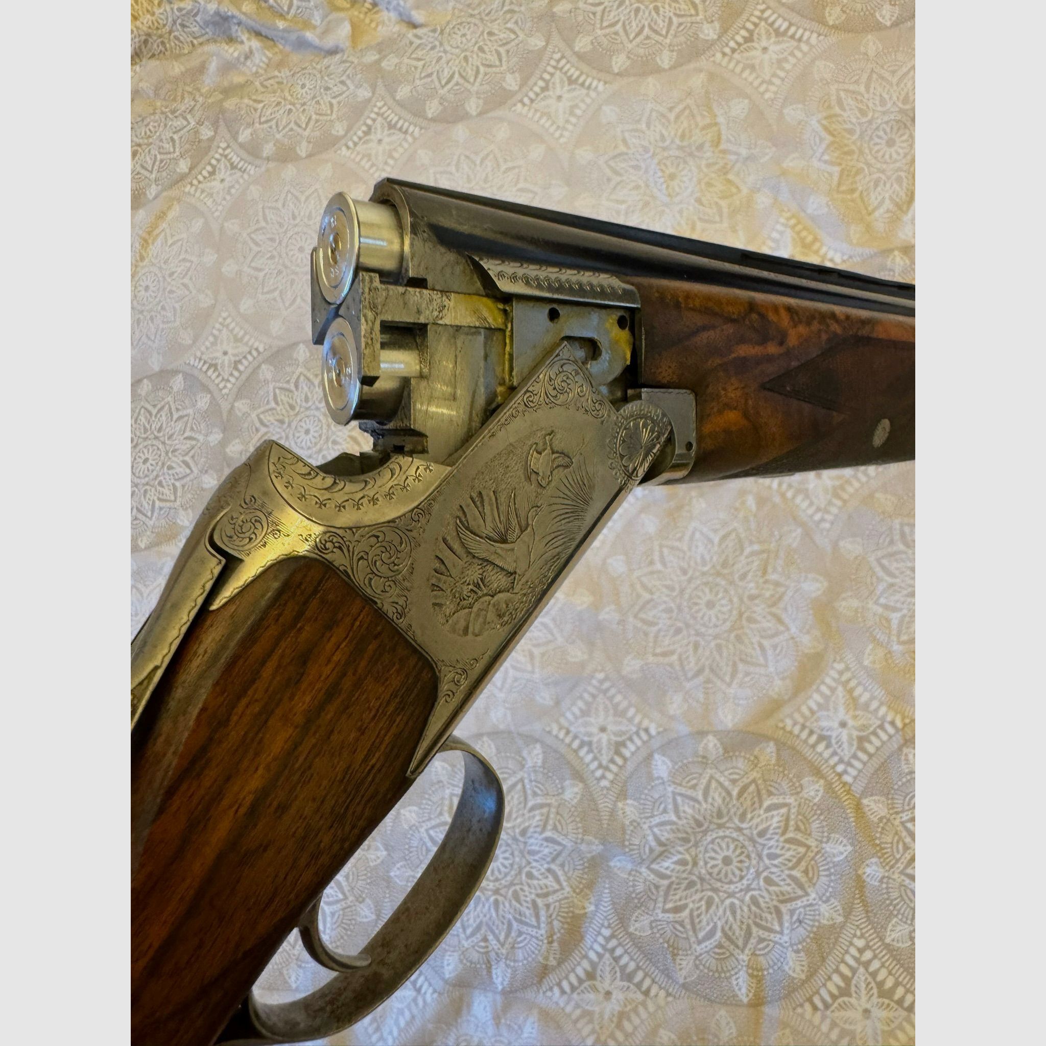 FN Browning B25 "Game Gun" B2G – Hand engraving, cal. 12/70 over-and-under shotgun