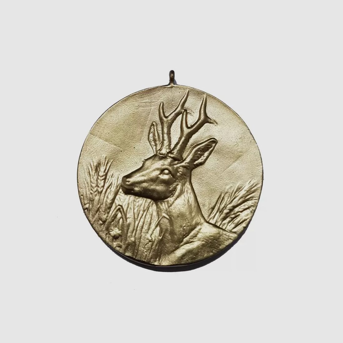 Trophy medal with an image of a roe buck, gold