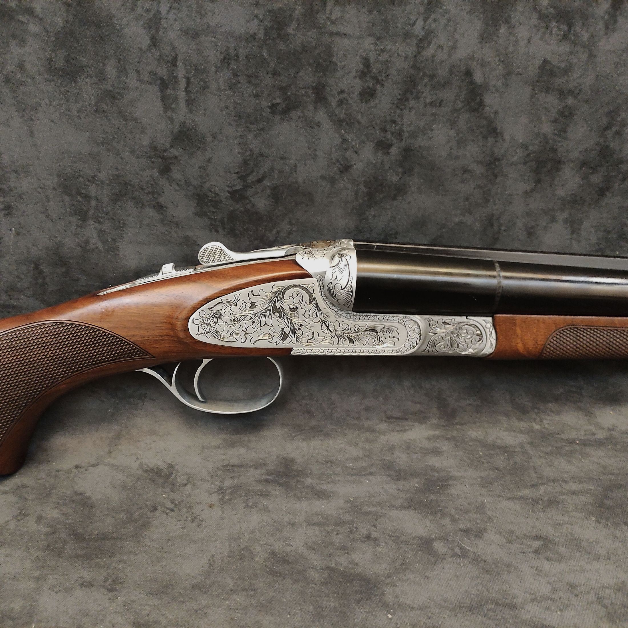 Huglu	 Huglu Kal.12/76  Mod.200AC Silber voll Graviert "Coachgun"