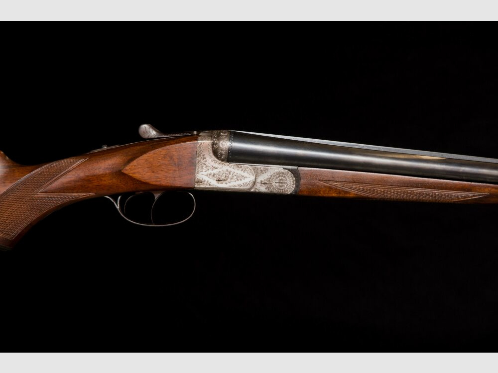 elegante Doppelflinte mit umfassender Gravur