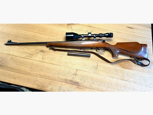 Repeater rifle Anschütz Mod. 1422 with German trigger including Tasco 4-12x56 scope and silencer