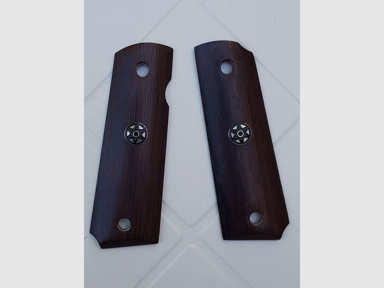 Grips of the Colt 1911 P.A.K