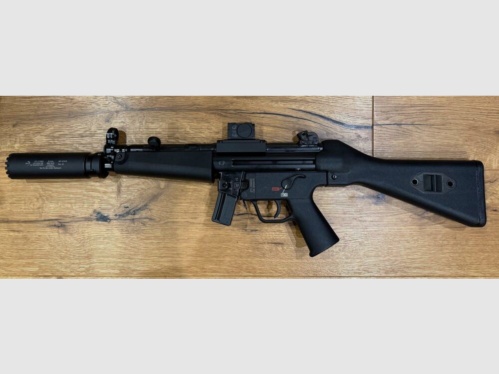 Karabin Heckler und Koch SP5 z tłumikiem B&T RBS Schalldämpfer SQD™ Compact i celownikiem Aimpoint ACRO