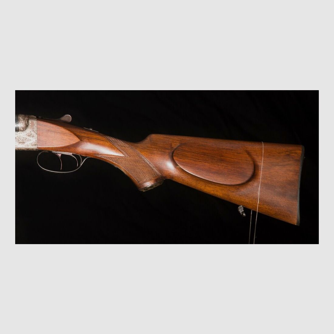 elegante Doppelflinte mit umfassender Gravur
