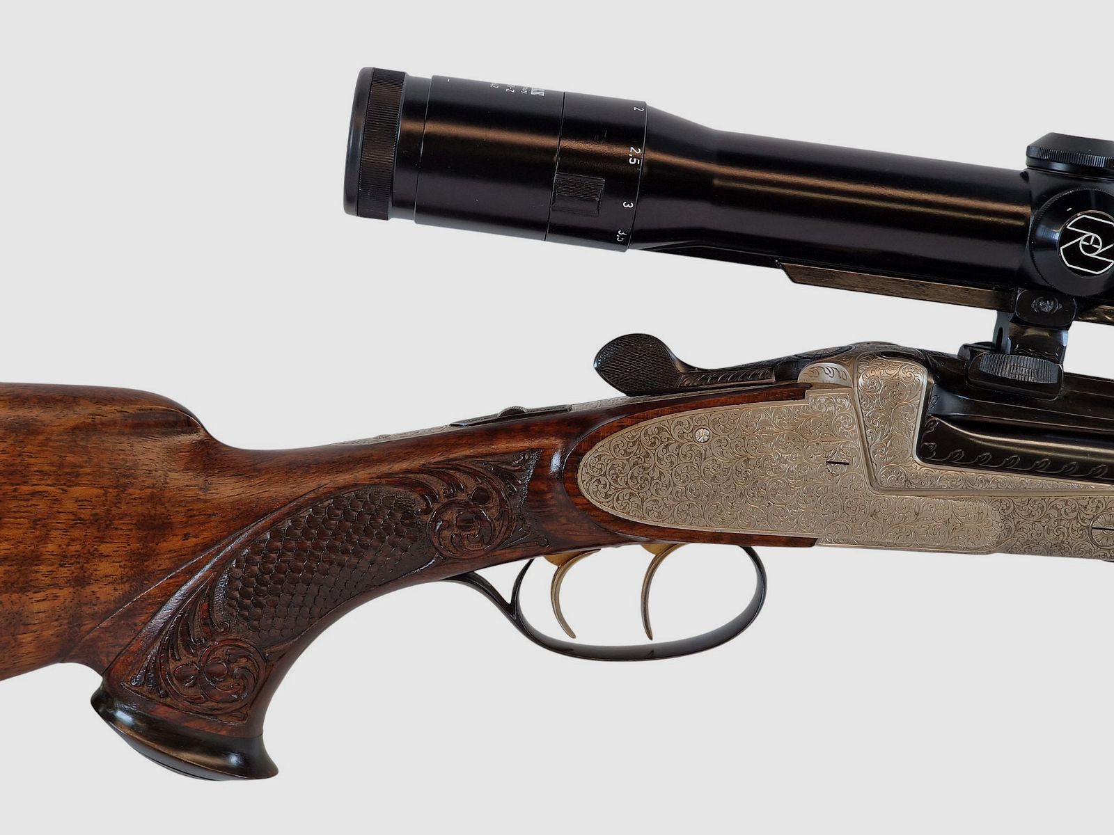 Outschar Ferlach side lock break-action rifle in caliber 6.5x57R with variable Zeiss optics