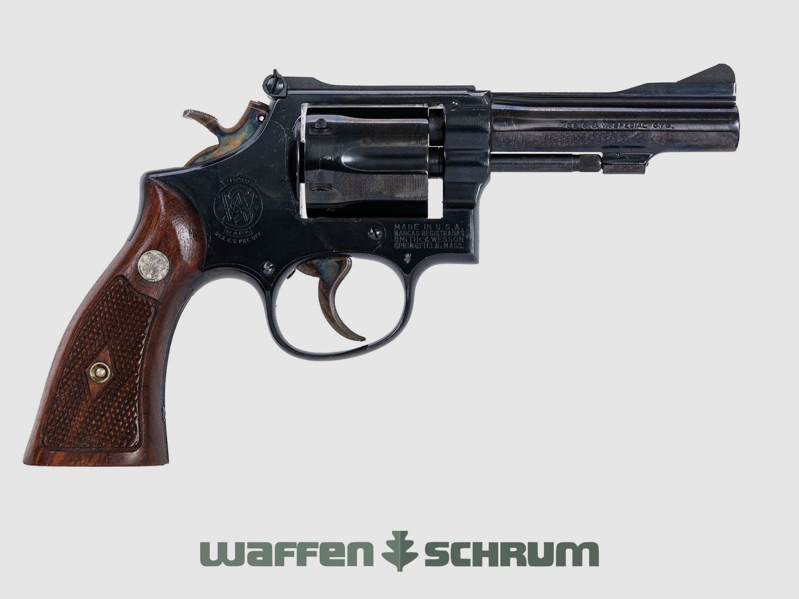 Smith & Wesson Mod. 15-2 .38Special, mirino regolabile, impugnature in legno, bluato, lunghezza canna: 4 pollici