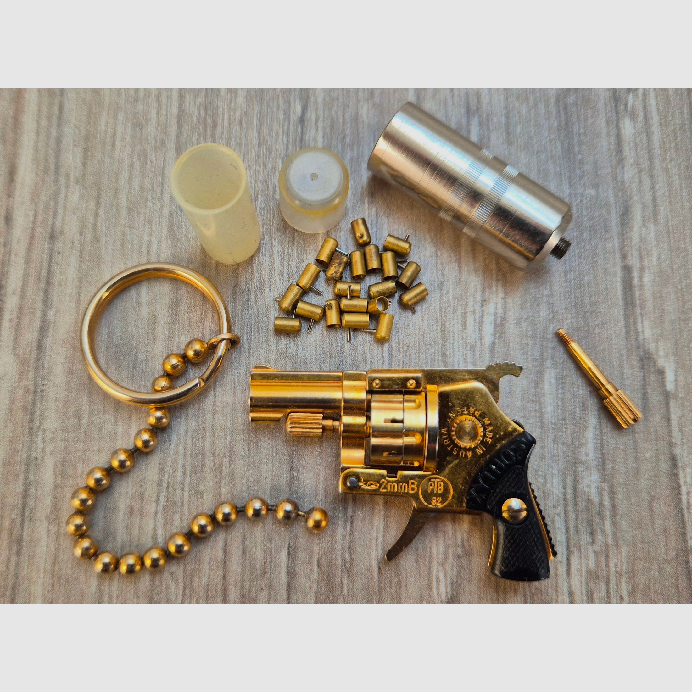 Xythos Automatikrevolver, 2mm, Gold, PTB 82!