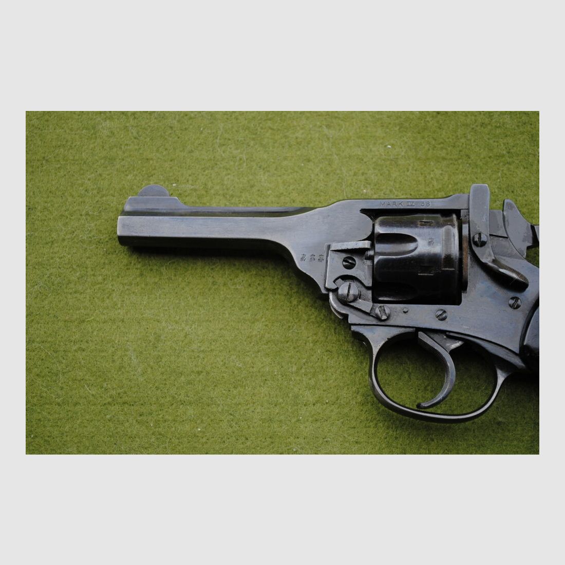 Webley MARK IV, various British stamps