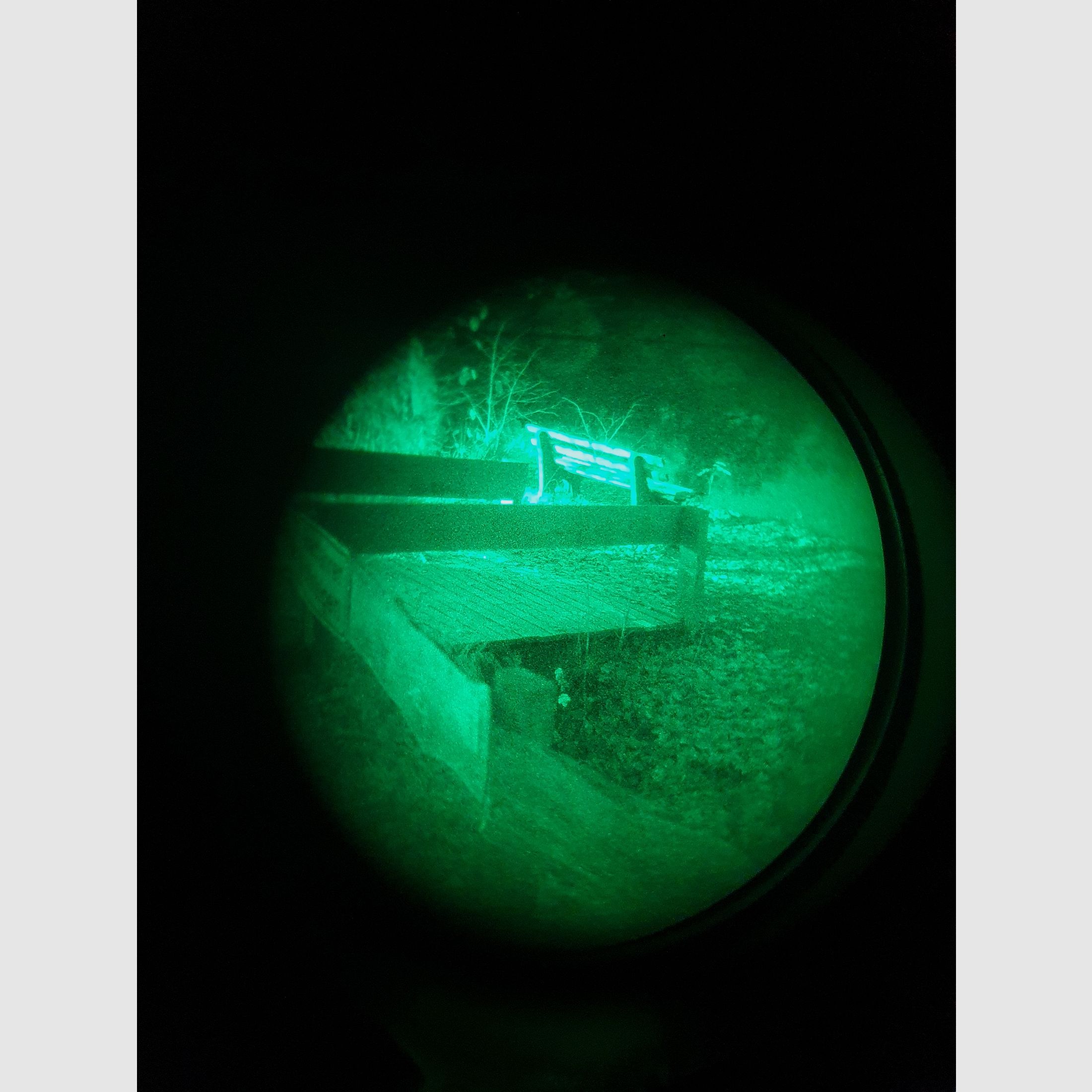 Night vision device residual light amplifier with helmet mount and carrying cap, so for wearing without a helmet