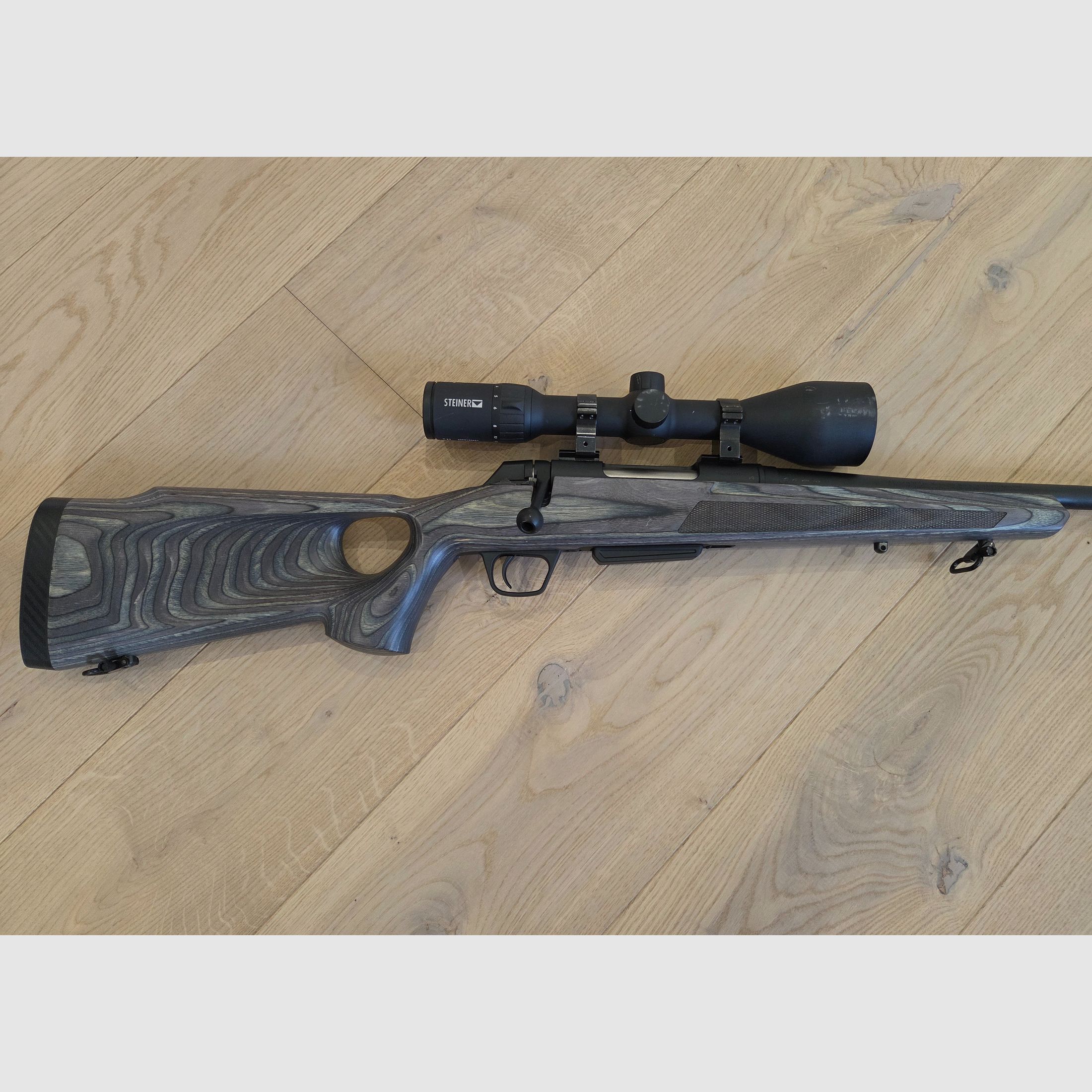 Winchester XPR repeating rifle in .308 with Steiner Ranger scope and silencer