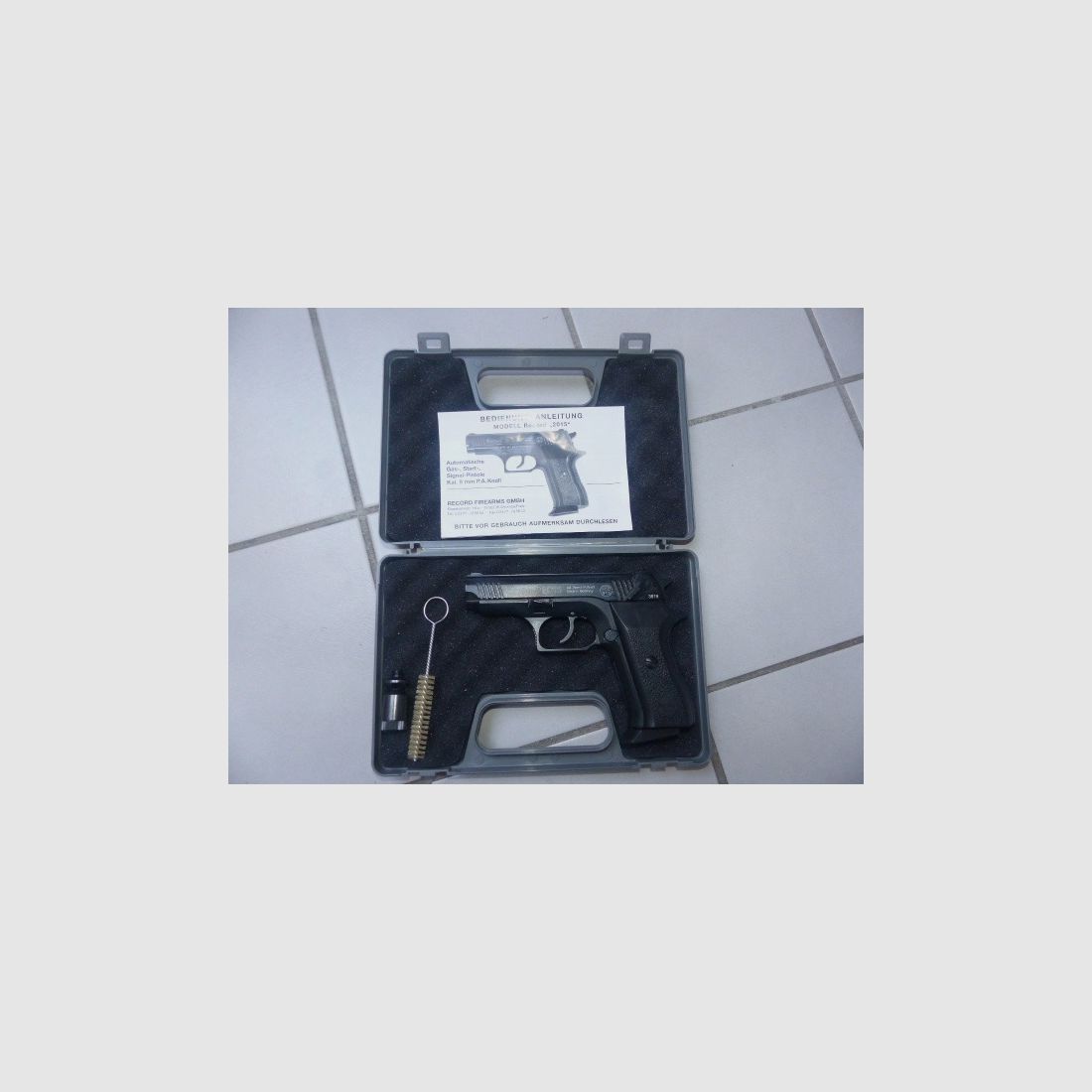 Record 2015 Cal. 9mm PAK New with case, blank firing adapter, brush, manual from collection plus 50 rounds of ammunition