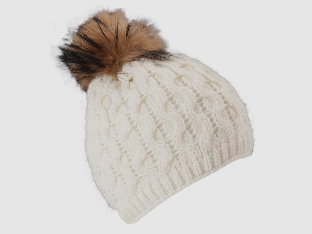 Cappello lavorato a maglia con pompon in pelliccia vera e motivo a nido d'ape