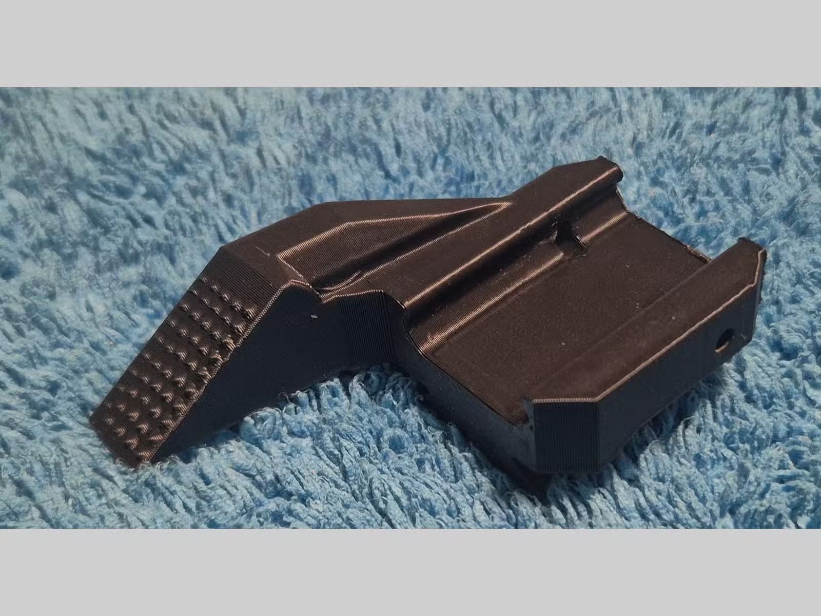 MUNITEX Thump-Rest Auflage / Daumenauflage für Pistolen mit Picatinny-Schiene
