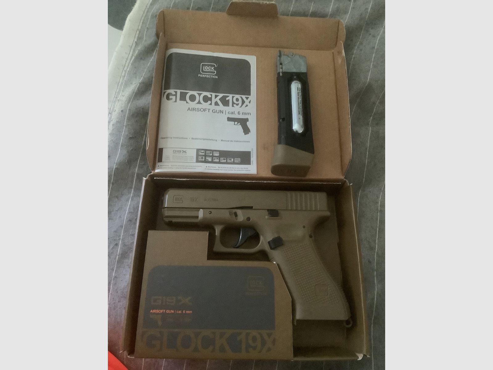 Umarex Glock 19X CO2. Pistole Coyote 19 Schuss