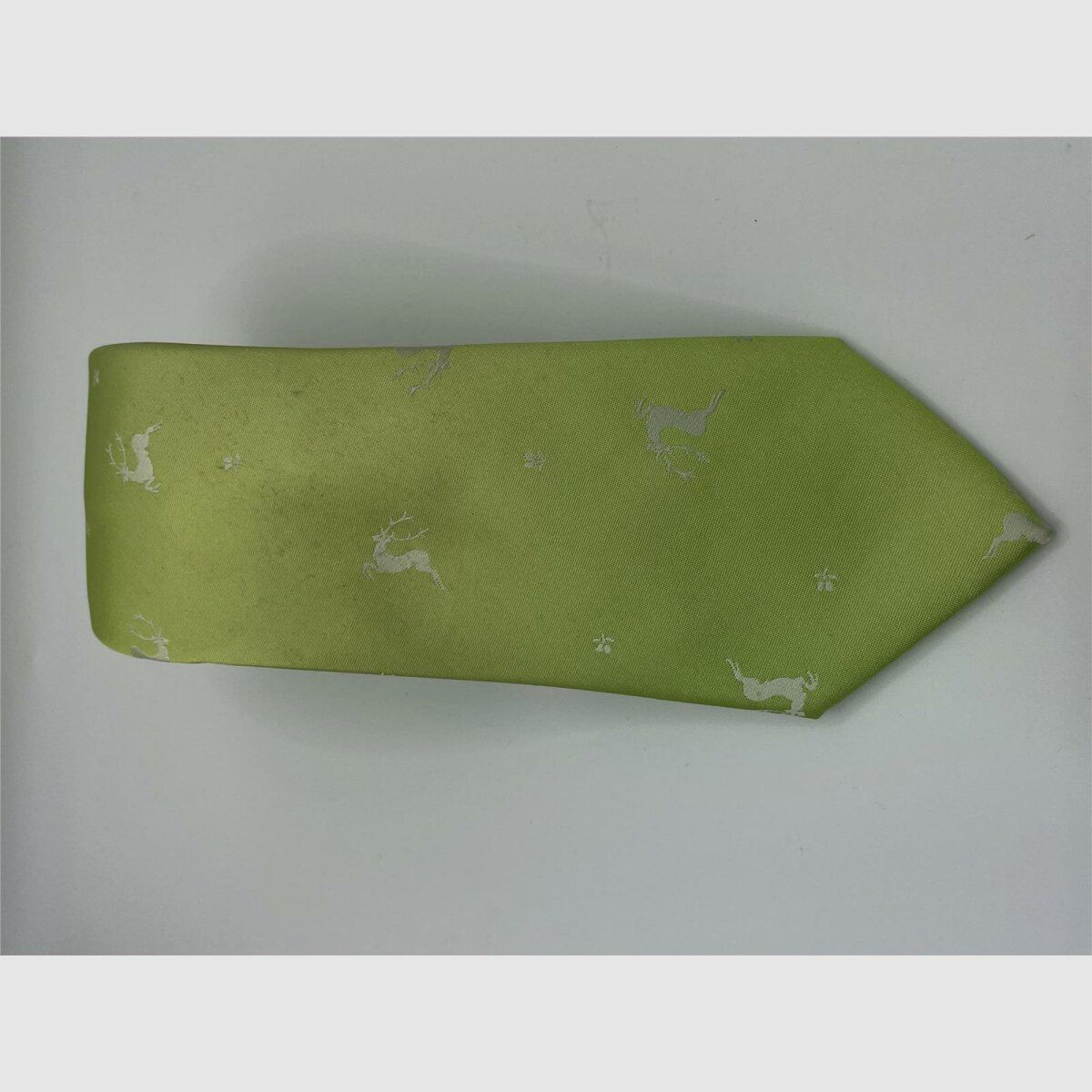 Cravatta verde chiaro motivo cervo argentato