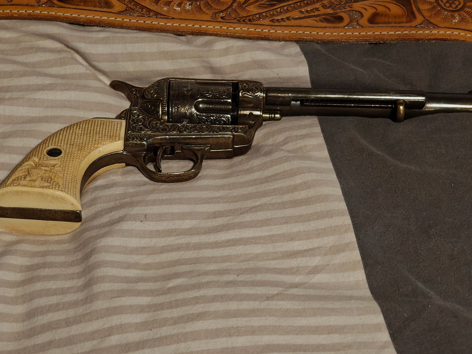 Weihrauch Western Single Action (SAA) revolver with the PTB 788 with white grip panels