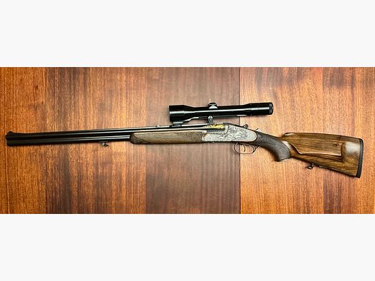 Luxury double rifle drilling Heym with master engraving (unique piece)